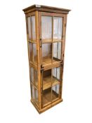 WORLD MARKET FURNITURE LIGHT STAINED WOOD AND GLASS FOUR TIER CURIO CABINET