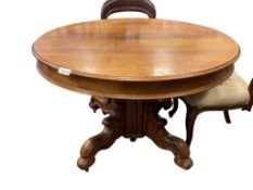 ANTIQUE SOLID OAK DINING TABLE WITH ELABORATE DUAL LEG BASE