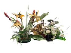 FOUR FAUX SILK PLANTS WITH DECORATIVE PLANTERS