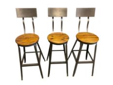 SET OF THREE WORLD MARKET WOOD AND BRUSHED METAL FARMHOUSE DESIGN BAR STOOLS