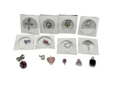 ASSORTED STERLING SILVER PENDANTS FEATURING CROSSES, CHRISTMAS THEMES, HEART LOCKET, AND MORE
