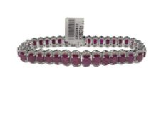 PLATINUM GRADUATED OVAL CUT MADAGASCAR RUBY AND DIAMOND FASHION LINK BRACELET