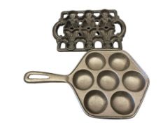 CAST IRON EBELSKIVER PAN AND CAST IRON GINGERBREAD MAN PAN