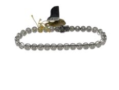 14K WHITE GOLD DIAMOND TENNIS BRACELET FEATURING MORE THAN 11CTTW IN ROUND BRILLIANT CUT DIAMONDS