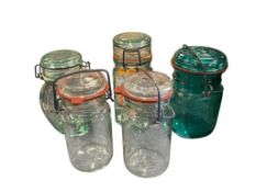 FIVE GLASS CANNING JARS INCLUDING ONE BALL EMBOSSED MASON JAR