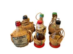 VINTAGE COLLECTIBLE 1/10 PINT WICKER AND STRAW WRAPPED GLASS LIQUOR BOTTLES