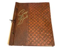 LARGE SCRAP BOOK WITH EPHEMERA FROM VIRGINIA CITY AND RENO, NEVADA BUSINESS CARDS, CASINO CLIPPINGS