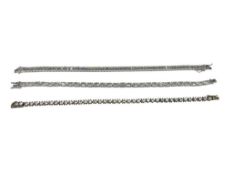 THREE STERLING SILVER CZ FASHION BRACELETS