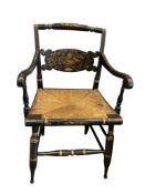 VINTAGE EBONIZED AND HARVEST STENCILED HITCHCOCK ARMCHAIR