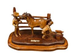 R. KLEMZ WESTERN FOLK ART WOOD SCULPTURE OF FARRIER AND COWBOY, ST. CLOUD MINNESOTA