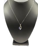 14K WHITE GOLD TANZANITE AND DIAMOND PENDANT NECKLACE