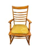 VINTAGE MID-CENTURY DANISH WOOD ROCKING CHAIR WITH UPHOLSTERED SEAT FEATURING FOLIATE PATTERN