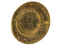 20TH CENTURY STAMPED BRASS RELIEF DECORATIVE CHARGER