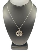 10K WHITE GOLD DIAMOND CUT PIERCED PENDANT ON 14K WHITE GOLD NECKLACE