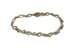 14K YELLOW GOLDD BAGUETTE AND ROUND CUT DIAMOND BRACELET FEATURING ETERNITY LINKS