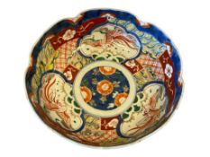 20TH CENTURY JAPANESE IMARI PORCELAIN BOWL WITH FLORAL AND PHOENIX DESIGN IN VIBRANT COLORS