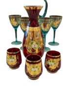 PIGEON BLOOD RED CARAFE WITH MATCHING GOBLETS, GILT AND ENAMELED DESIGN
