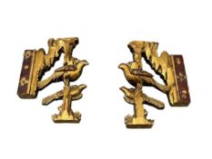 MID-CENTURY HOLLYWOOD REGENCY STYLE CARVED WOOD AND GILDED BIRD ARCHITECTURAL BRACKETS