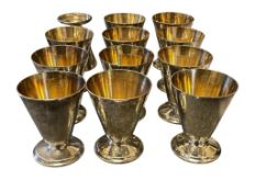 VINTAGE STERLING SILVER HALLMARKED FOOTED CORDIALS TOTAL OF 12 TOTAL WEIGHT 1,020 GRAMS