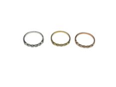 SET OF THREE STERLING SILVER TRI-COLOR TONED CZ FASHION RINGS