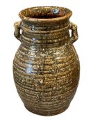 EARLY 20TH CENTURY JAPANESE HAND TURNED POTTERY DRIP GLAZE VASE, EAR HANDLES