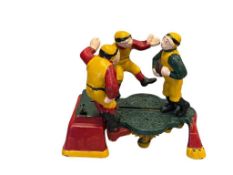 REPRODUCTION CAST IRON RUGBY MECHANICAL COIN BANK