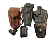 LEATHER HAND GUN HOLSTERS AND POUCHES