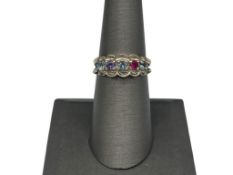 VINTAGE STERLING SILVER PRECIOUS STONE RING FEATURING ROUND CUT PRECIOUS STONES INCLUDING RUBY