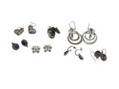SEVEN PAIRS OF STERLING SILVER EARRINGS FEATURING VARIOUS DESIGNS