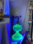 EARLY 20TH CENTURY MANGANESE GLASS ART DECO PERIOD OIL LAMP WITH CLEAR GLASS CHIMNEY