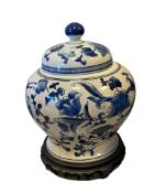 BLUE AND WHITE CRACKLE FINISHED CHINOSERIE POECELAIN JAR WITH FLORAL AND FIGURAL DESIGN