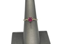 ANTIQUE 14K WHITE GOLD RING FEATURING SYNTHETIC RED STONE