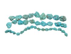 THREE STRANDS OF DYED TURQUOISE HOWLITE NUGGETS
