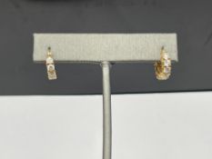 PAIR OF 14K YELLOW GOLD CZ HUGGIE EARRINGS