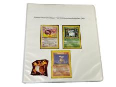 BINDER OF POKEMON GAME TRADING CARDS FEATURING FIRST EDITIONS, RARES, HOLOS, AND DOUBLE RARE CARD