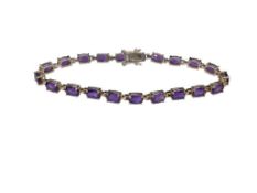 GOLD TONE STERLING SILVER AMETHYST TENNIS BRACELET FEATURING OVAL CUT AMETHYSTS