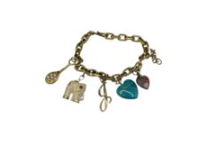 VINTAGE GOLD TONE CHARM BRACELET WITH TWO 14K YELLOW GOLD CHARMS