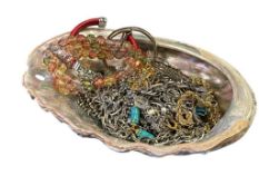 ABALONE SEASHELL FILLED WITH WOMEN'S FASHION JEWELRY BRACELETS, NECKLACES, PENDANTS, ETC.