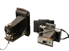 ANTIQUE EASTMAN KODAK POCKET FOLDING CAMERA MODEL C NO. 3-A AND POLAROID 101 LAND CAMERA