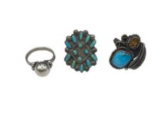 THREE STERLING SILVER RINGS INCLUDING TWO VINTAGE NAVAJO STERLING SILVER TURQUOISE RINGS
