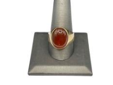 MEN'S 10K YELLOW GOLD OVAL CABOCHON CARNELIAN RING