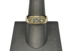 14K YELLOW GOLD DIAMOND BAND FEATURING THREE .25CT ROUND BRILLIANT CUT DIAMONDS
