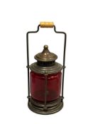 ANTIQUE STYLED METAL LANTERN VOTIVE HOLDER WITH RUBY RED GLASS GLOBE