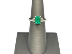 LADIES' PLATINUM, DIAMOND, AND EMERALD RING FEATURING A 1.435CT RECTANGULAR STEP CUT EMERALD