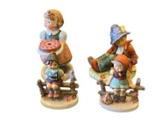 COLLECTION OF FOUR PORCELAIN HUMMEL FIGURINES TWO ARE SIGNED COLLECTORS CLUB