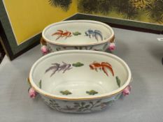 TWO CHINESE PORCELAIN INSECT AND BERRY DECORTED PLANTERS WITH KOI FISH