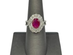 LADIES' OSCAR FRIEDMAN DESIGNER HALLMARKED PLATINUM OVAL CUT BURMESE RUBY AND DIAMOND RING