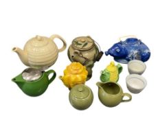 COLLECTION OF TEAPOTS INCLUDING FIGURAL TEAPOTS, CHINESE TEA CUPS, CREAMER AND SUGAR
