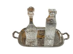 TWO ELEGANT CRYSTAL LIQUOR DECANTERS INCLUDING ONE BY DUBLIN ON SILVER PLATED TRAY