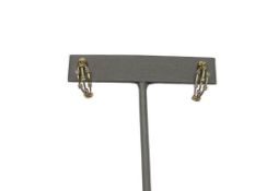 10K YELLOW GOLD DIAMOND EARRINGS FEATURING UNIQUE THREE BAND DESIGN